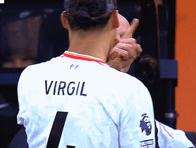 A Soccer Player Wearing A White Jersey With The Name Virgil On The Back GIF