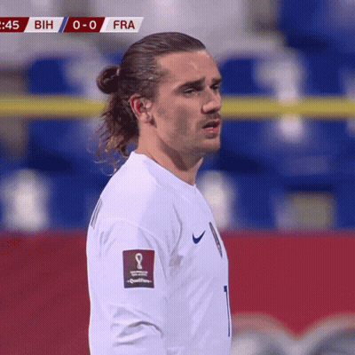 A Soccer Player Wearing A White Jersey With The Number 1 On The Front GIF