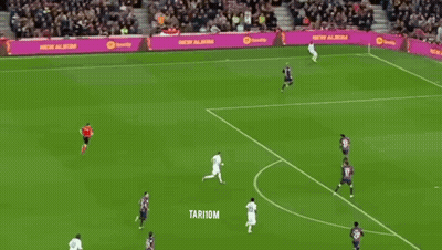 A Soccer Player Wearing A White Jersey With The Number 22 On It GIF