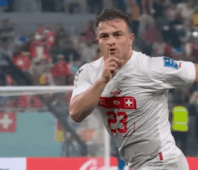 A Soccer Player Wearing A White Jersey With The Number 23 GIF