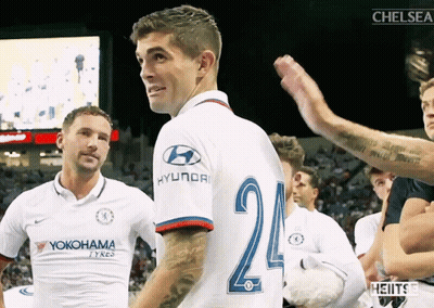 A Soccer Player Wearing A White Jersey With The Number 24 On The Back GIF