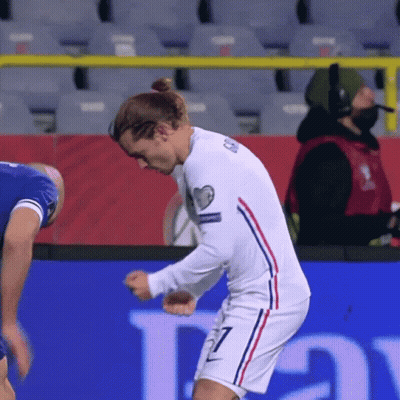 A Soccer Player Wearing A White Jersey With The Number 7 On It GIF