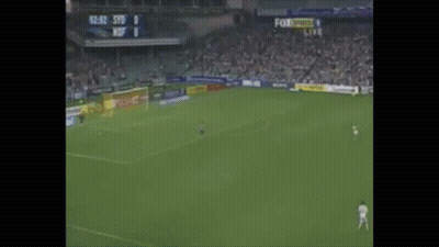 A Soccer Player Wearing A White Jersey With The Number 9 GIF