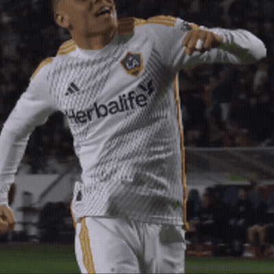 A Soccer Player Wearing A White Jersey With The Word Herbalife On It GIF