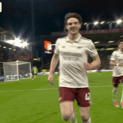 A Soccer Player Wearing A White Shirt That Says Emirates GIF
