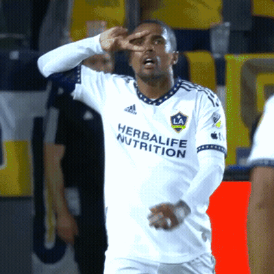 A Soccer Player Wearing A White Shirt That Says Herbalife Nutrition On It GIF