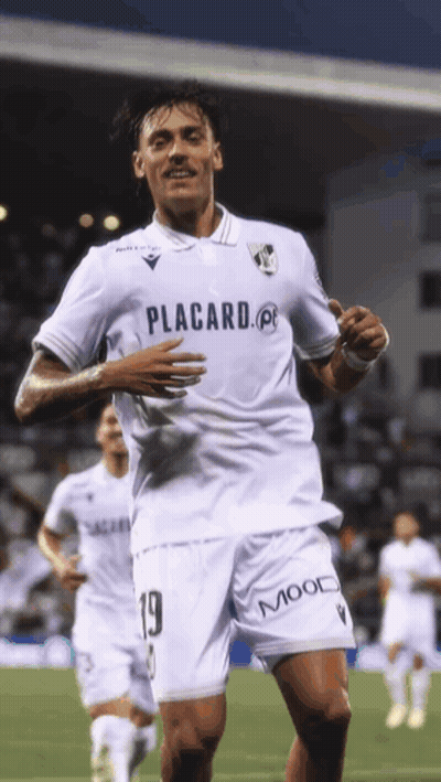 A Soccer Player Wearing A White Shirt That Says Placard On It GIF