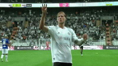 A Soccer Player Wearing A White Shirt That Says ' Rio ' On The Front GIF