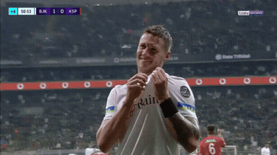 A Soccer Player Wearing A White Shirt With Rain On It GIF