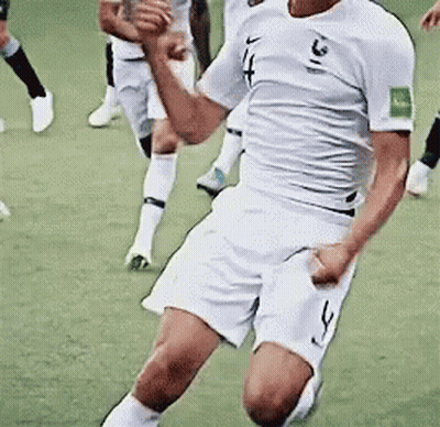 A Soccer Player Wearing A White Shirt With The Number 31 On The Sleeve GIF