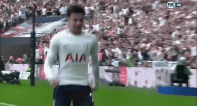 A Soccer Player Wearing A White Shirt With The Word Aia On It Is Running On A Field . GIF
