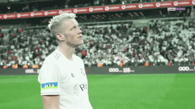 A Soccer Player Wearing A White Shirt With The Word Aksa On His Sleeve GIF