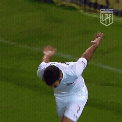 A Soccer Player Wearing A White Under Armour Jersey Is Running On The Field GIF