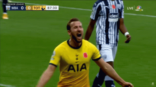 A Soccer Player Wearing A Yellow Aia Jersey Celebrates On The Field GIF