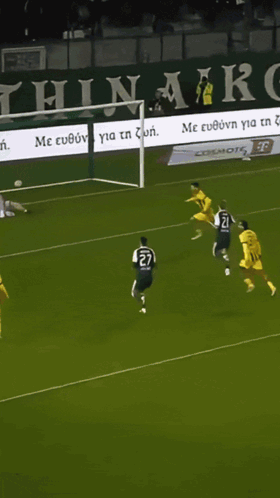 A Soccer Player Wearing A Yellow And Black Jersey With The Number 9 On It GIF