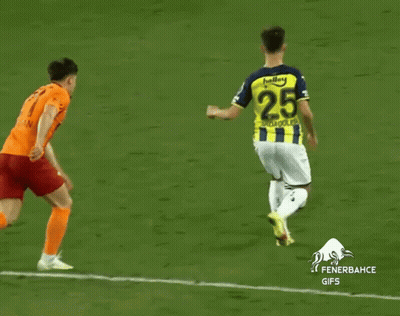 A Soccer Player Wearing A Yellow And Blue Jersey With The Number 25 GIF