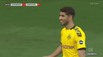 A Soccer Player Wearing A Yellow Bvb Jersey GIF