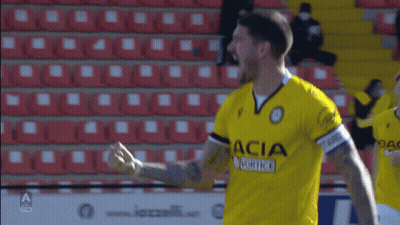 A Soccer Player Wearing A Yellow Dacia Jersey GIF
