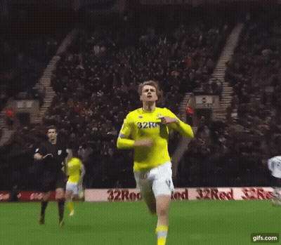 A Soccer Player Wearing A Yellow Jersey That Says 32Red On It GIF