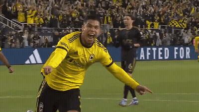 A Soccer Player Wearing A Yellow Jersey That Says Adidas On It GIF