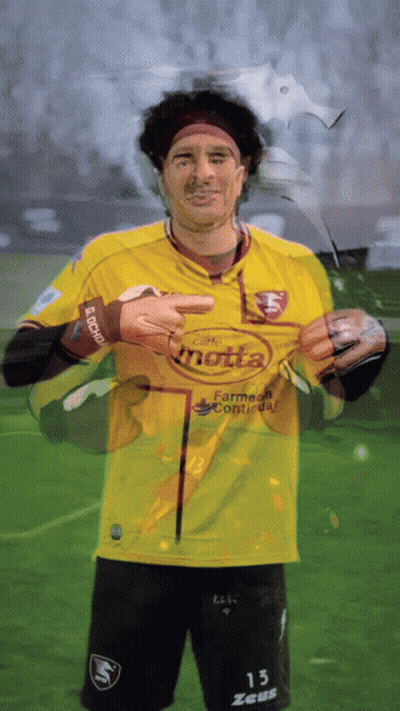 A Soccer Player Wearing A Yellow Jersey That Says Motta GIF