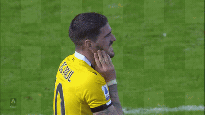 A Soccer Player Wearing A Yellow Jersey That Says Serie A GIF