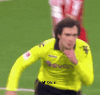A Soccer Player Wearing A Yellow Jersey With The Number 16 On The Front GIF
