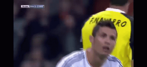 A Soccer Player Wearing A Yellow Shirt That Says Emaarro On It GIF