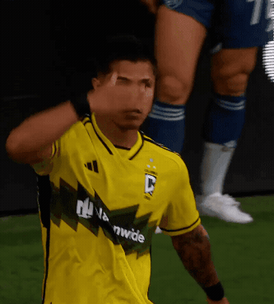 A Soccer Player Wearing A Yellow Shirt That Says Worldwide GIF