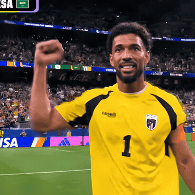 A Soccer Player Wearing A Yellow Shirt With The Number 1 On It GIF