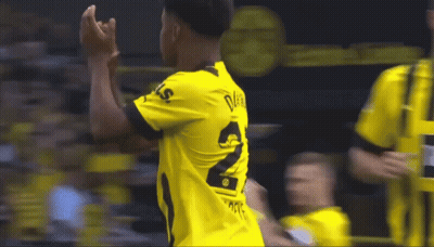 A Soccer Player Wearing A Yellow Shirt With The Number 2 On It GIF