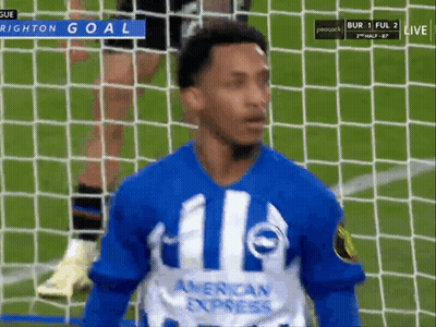 A Soccer Player Wearing An American Express Shirt Stands In Front Of The Goal GIF