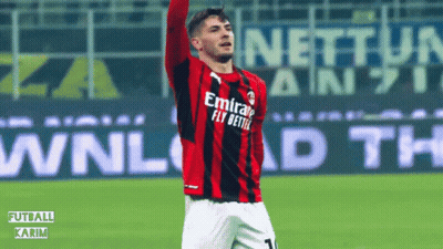 A Soccer Player Wearing An Emirates Fly Better Jersey Celebrates GIF