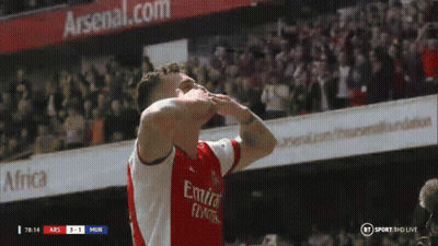 A Soccer Player Wearing An Emirates Fly Emirates Jersey Celebrates GIF