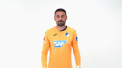 A Soccer Player Wearing An Orange Shirt With The Word Sap On It GIF