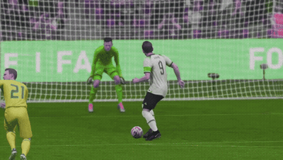 A Soccer Player Wearing Number 9 Kicks The Ball GIF