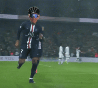 A Soccer Player Wearing Sunglasses And A Helmet With The Number 7 On His Jersey GIF