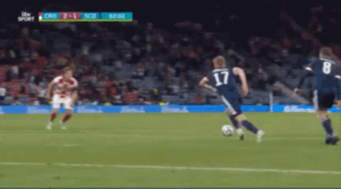 A Soccer Player Wearing The Number 17 Kicks The Ball GIF