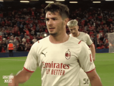 A Soccer Player Wears A White Emirates Fly Better Shirt GIF