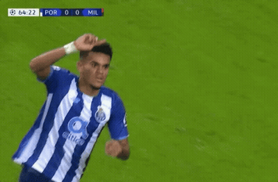 A Soccer Player Wipes His Face With His Hand During A Game GIF