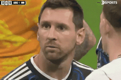 A Soccer Player With A Beard Is Talking To Another Player On A Field . GIF