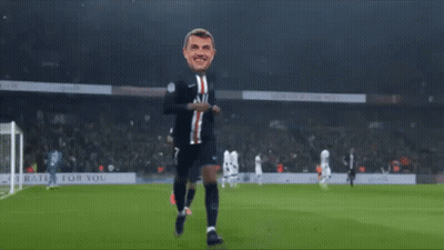 A Soccer Player With A Mask On His Head Is Running On A Field GIF