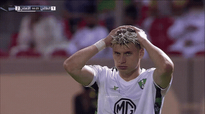 A Soccer Player With A Mc Logo On His Shirt Holds His Head GIF