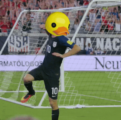 A Soccer Player With A Yellow Duck Head And The Number 10 GIF