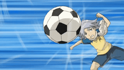 A Soccer Player With A Yellow Shirt That Says ' Tokyo ' On It Is Kicking A Soccer Ball GIF