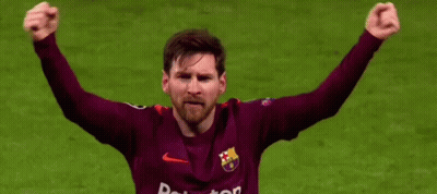 A Soccer Player With His Arms In The Air Wearing A Rakuten Jersey . GIF