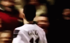 A Soccer Player With The Name Gigg On The Back Of His Shirt GIF
