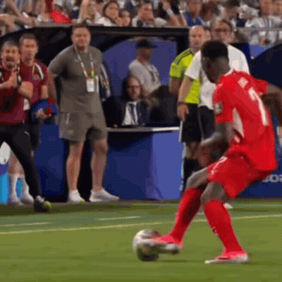A Soccer Player With The Number 1 On His Jersey Is Kicking A Ball GIF