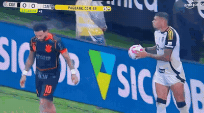 A Soccer Player With The Number 10 On His Jersey Holds A Ball GIF