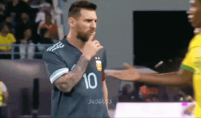 A Soccer Player With The Number 10 On His Jersey Holds His Finger To His Mouth GIF